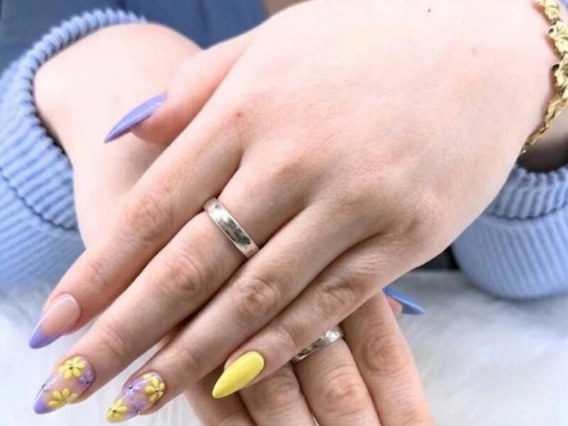 Lilac and yellow almond nails with painted flowers